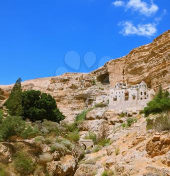 The famous Orthodox monastery of St. George. The building of the monastery was built on the wall of the gorge of Wadi Kelt. Israel