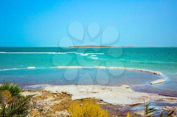 Forever Living Dead Sea. Picturesque islands of medicinal salt in the lake. Israel, spring. The concept of ecological and medical tourism