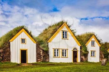 Ethnographic Museum-estate Glaumbaer, Iceland. The concept of the historical and cultural tourism. The picturesque village of old houses covered with turf and grass