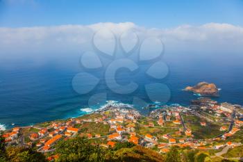 The magical tropical island of Madeira. A picturesque resort village on the Atlantic ocean be. Concept of exotic and ecological tourism