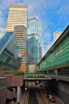 HONG KONG - DECEMBER 11, 2014: Hong Kong Special Administrative Region. Modern skyscrapers and narrow streets between them