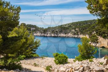 The narrow bays - fjords with rocky steep banks. National Park Calanques on the Mediterranean coast.   Provence, France, spring