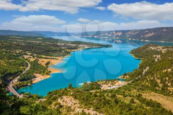 Magnificent lake with turquoise water among wooded hills. Canyon of Verdon, Provence, May