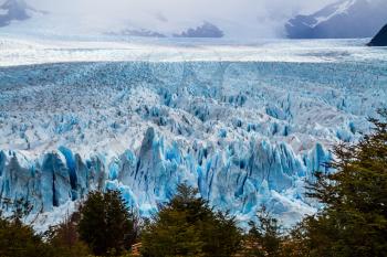 The spectacular glacier Perito Moreno, located in the national park of Los Glaciares in the Argentine part of Patagonia.  The concept of exotic and extreme tourism