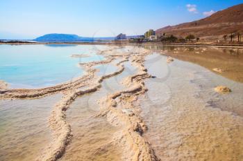  The concept of medical and ecological tourism. Reduced water in the salty Dead Sea, Israel. 
