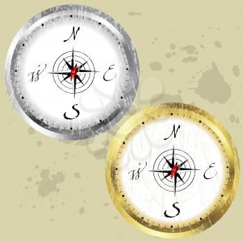 Royalty Free Clipart Image of Silver and Gold Compasses on a Grunge Background