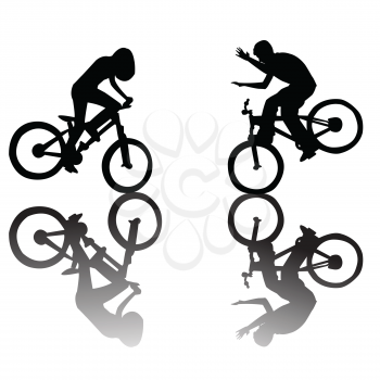 Silhouettes of children riding a bike