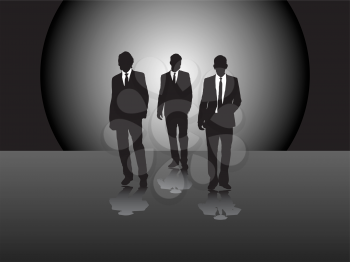 Royalty Free Clipart Image of Three Silhouetted Businessmen