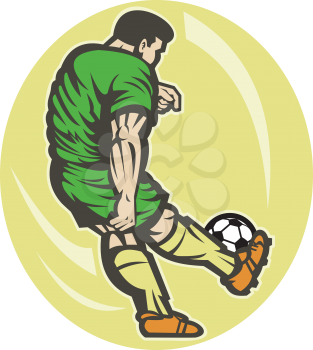 Royalty Free Photo of a Soccer Player Kicking the Ball