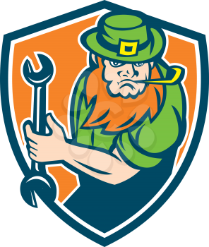 Illustration of a leprechaun mechanic holding spanner wrench facing front set inside shield crest on isolated background done in retro style. 