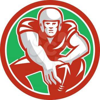Illustration of an american football player in snap position viewed from front set inside circle on isolated background done in retro style. 