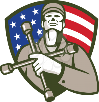 Illustration of a mechanic worker holding tire wrench, 4-way lug wrench, or tyre iron on chest looking up set in shield crest with american usa flag stars and stripes in background done retro style. 