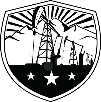 Retro style illustration of an oil derrick with mountain and sunburst in background set inside crest, shield or badge on isolated background.