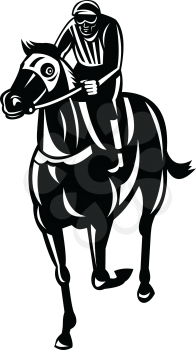 Retro style illustration of a jockey racing thoroughbred horse or galloper, a popular gaming and spectator sport viewed from front  on isolated background done in black and white.