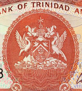 Royalty Free Photo of Trinidad and Tobago Arms on 1 Dollar 2003 Banknote From Trinidad and Tobago.