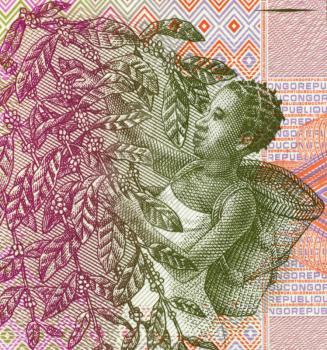 Royalty Free Photo of a Woman Harvesting Coffee Beans on 1 Centime 1997 Banknote from Congo.