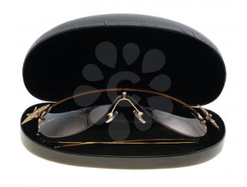 Brown sunglasses in the case on white background, isolated