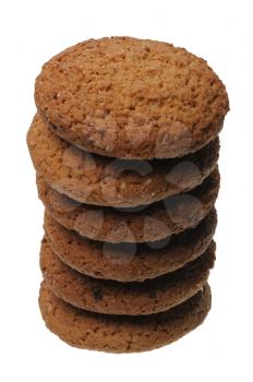 A stack of several pieces of brown cookies, isolated