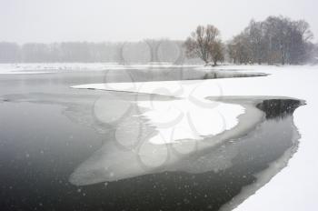 Royalty Free Clipart Image of a River Scene in Winter