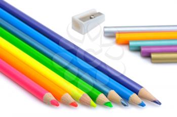 Royalty Free Photo of Pencil Crayons and a Sharpener