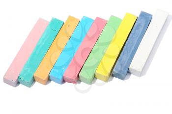 Colored crayon chalk on a white background isolated.