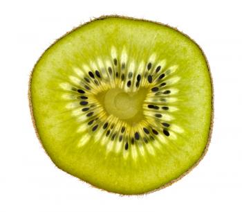 Thin slices of kiwi fruit on white background, isolated
