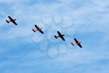 Royalty Free Photo of Four Planes Against a Blue Sky