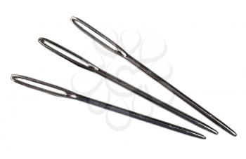 Three steel sewing needles, isolated