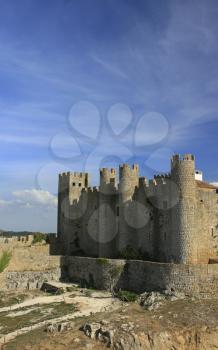 Royalty Free Photo of a Medieval European Fortress With Towers in Portugal, Obidos