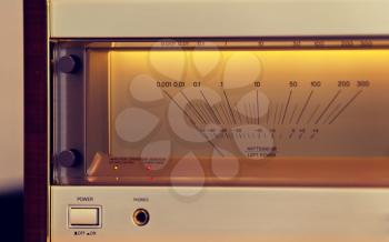Vintage Stereo Audio Power Amplifier Large Glowing VU Meter Closeup