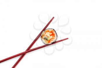 salmon Sushi with chopsticks isolated over white background