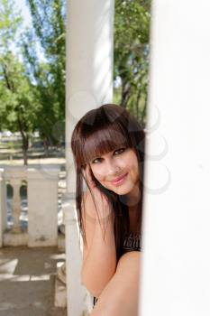 Outdoor portrait of a beautiful young brunette Caucasian woman