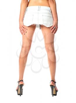 Sexy long female legs isolated over white background in skirt