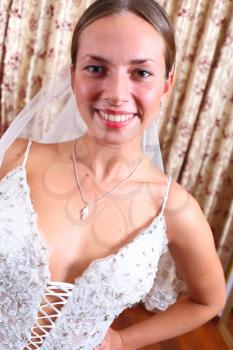 young charming bride looks into camera, closeup