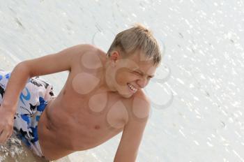 Royalty Free Photo of a Young Man at Beach
