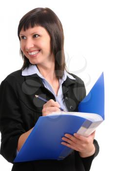 Royalty Free Photo of a Businesswoman Writing in a Binder
