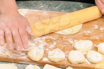 Royalty Free Photo of a Woman Preparing Dough