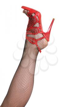 Royalty Free Photo of a Woman's Leg Wearing a High Heel