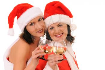 Royalty Free Photo of Two Women in Santa Hats Toasting