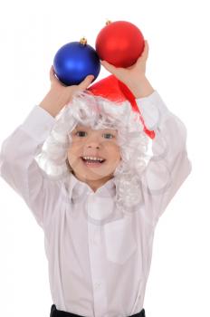 Royalty Free Photo of a Little Boy Holding Christmas Decorations