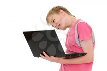 Royalty Free Photo of a Boy Holding a Laptop