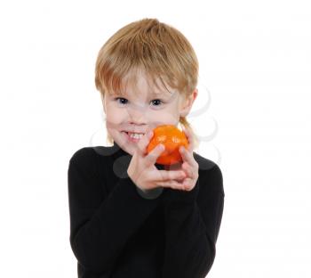 Royalty Free Photo of a Little Boy Holding an Orange