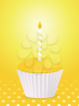 Yellow cupcake with single burning candle on a yellow polka dot background