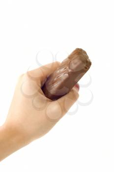 Royalty Free Photo of a Woman Holding a Chocolate Bar
