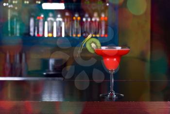 Royalty Free Photo of a Cocktail With Kiwi on a Bar