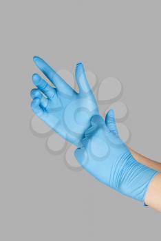Royalty Free Photo of a Person Wearing Gloves