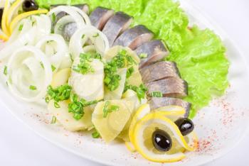 Royalty Free Photo of Herring With Potato and Vegetables