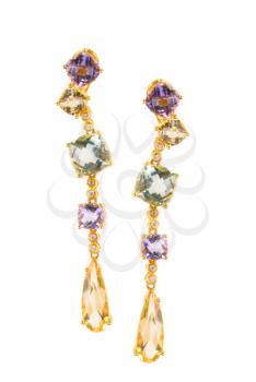 gold earring with gems isolated on a white