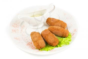 cutlets of meat and lettuce isolated on a white