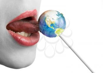 Royalty Free Photo of a Woman Eating a Lollipop 